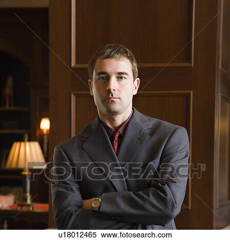 Stock Photography - businessman with arms crossed.. Fotosearch