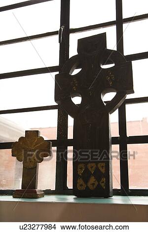 Picture - Celtic crosses sitting on windowsill. Fotosearch