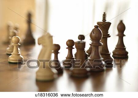Chess pieces on chess board View Large Photo Image Stock Photograph - Chess pieces on chess board. Fotosearch