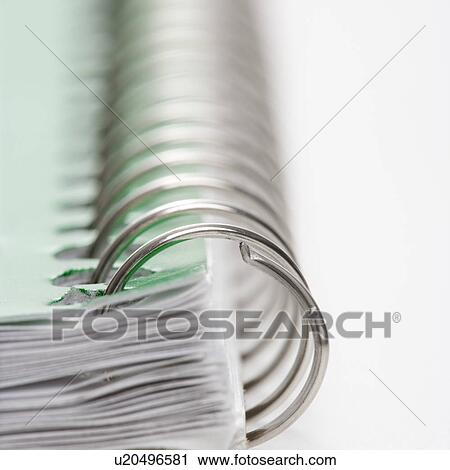 Stock Image - Close up of spiral bound notebook. Fotosearch