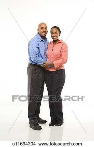 Picture - Couple with arms around each other. Fotosearch