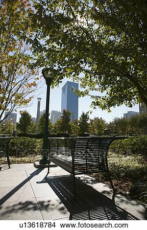 Empty bench in urban park in Atlanta, Georgia View Large Photo Image Picture - Empty bench in urban park in Atlanta, Georgia . Fotosearch