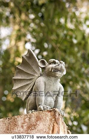 Stock Photo - Gargoyle statue outdoors. Fotosearch