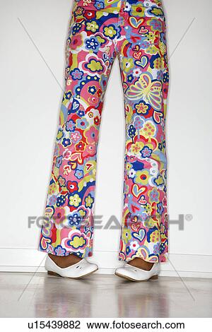 Girl's legs with floral pants View Large Photo Image Stock Image - Girl's legs with floral pants. Fotosearch