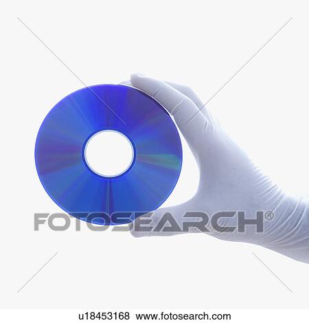Stock Photo - Hand in latex glove holding compact disc against white background. Fotosearch