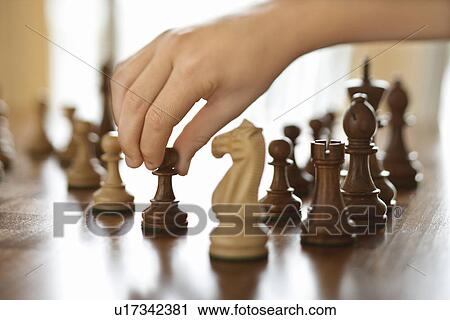 hand moving chess piece View Large Photo Image Stock Image - hand moving chess piece. Fotosearch