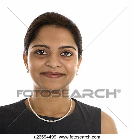 Stock Photo - Head and shoulder portrait of pretty mid adult Indian woman.. Fotosearch