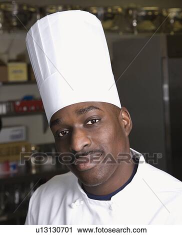 Head shot of chef wearing traditional uniform and toque looking at viewer. View Large Photo Image Stock Image - Head shot of chef wearing traditional uniform and toque looking at viewer.. Fotosearch