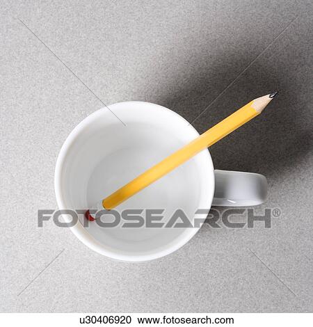 High angle view of a pencil in an empty white coffee cup. View Large Photo Image Stock Image - High angle view of a pencil in an empty white coffee cup.. Fotosearch