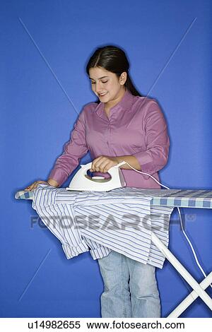 Stock Photography - Ironing shirt. Fotosearch