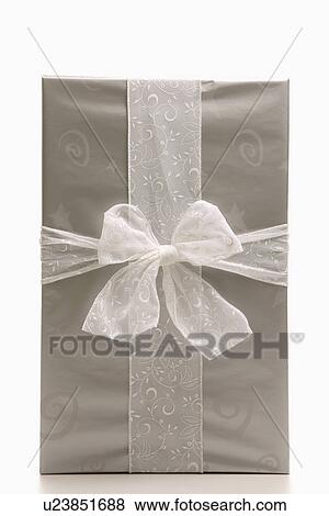 Stock Photo - Large silver wrapped gift with bow. Fotosearch