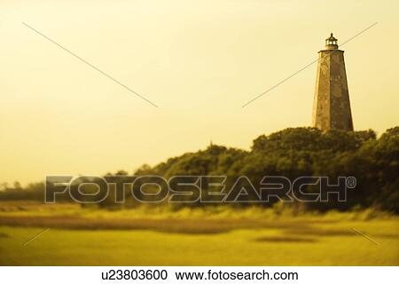 Stock Image - Lighthouse on Bald Head Island, North Carolina. Fotosearch