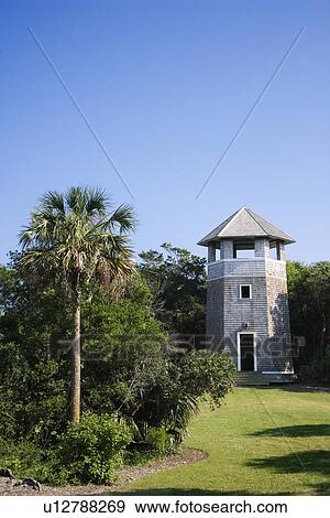 Lighthouse shaped building on Bald Head Island, North Carolina. View Large Photo Image Stock Photo - Lighthouse shaped building on Bald Head Island, North Carolina.. Fotosearch