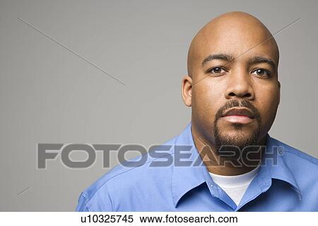 Man against gray background View Large Photo Image Stock Photography - Man against gray background. Fotosearch