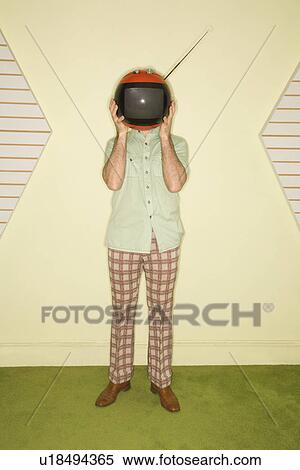 Man holding retro television in place of head View Large Photo Image Stock Photography - Man holding retro television in place of head. Fotosearch