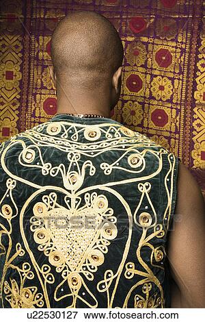 Man wearing embroidered African vest View Large Photo Image Stock Photo - Man wearing embroidered African vest. Fotosearch