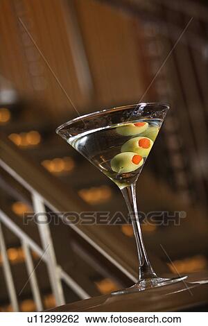 Martini with olives View Large Photo Image Stock Image - Martini with olives. Fotosearch