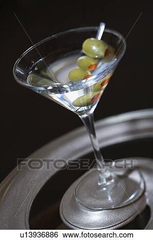 Martini with olives View Large Photo Image Stock Photograph - Martini with olives. Fotosearch
