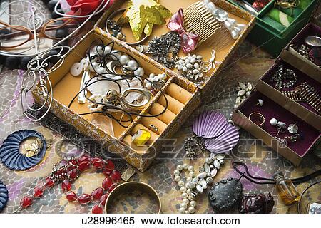 Stock Photography - Open jewelry box sitting on top of dresser. Fotosearch