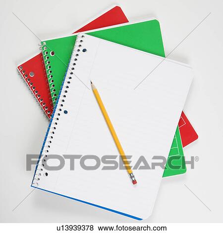 Pencil on top of three spiral bound notebooks View Large Photo Image Stock Photo - Pencil on top of three spiral bound notebooks. Fotosearch