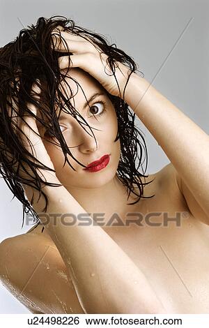 Redhead woman with wet hair View Large Photo Image Stock Photograph - Redhead woman with wet hair. Fotosearch