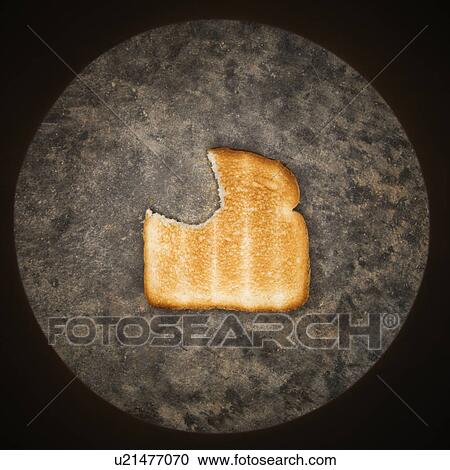 Stock Image - Slice of with bite missing. Fotosearch
