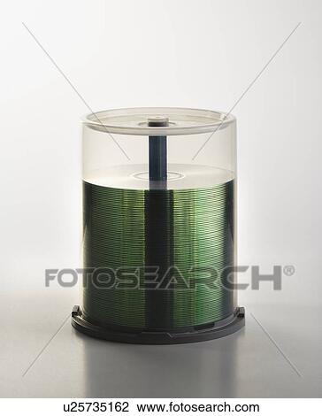 Stock Image - Stack of compact discs in case. Fotosearch
