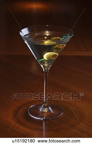 Stock Image - Still life of martini on bar.. Fotosearch