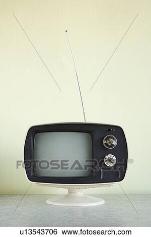 Still life of vintage television set with antenna raised. View Large Photo Image Stock Photograph - Still life of vintage television set with antenna raised.. Fotosearch