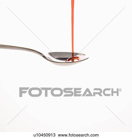 Stream of red cough syrup being poured into spoon. View Large Photo Image Stock Image - Stream of red cough syrup being poured into spoon.. Fotosearch