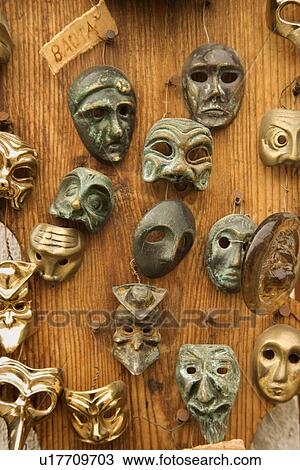 theatrical masks hanging on wooden wall View Large Photo Image Stock Image - theatrical masks hanging on wooden wall. Fotosearch