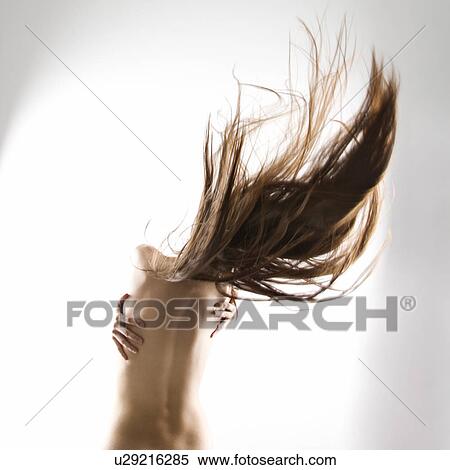 Topless woman swinging her hair View Large Photo Image Stock Photography - Topless woman swinging her hair. Fotosearch