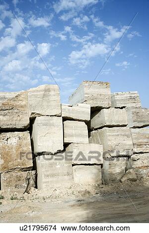 Picture - Travertine stone excavated from open mine quarry.. Fotosearch
