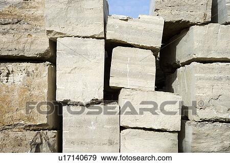 Stock Photo - Travertine stone excavated from open mine quarry.. Fotosearch