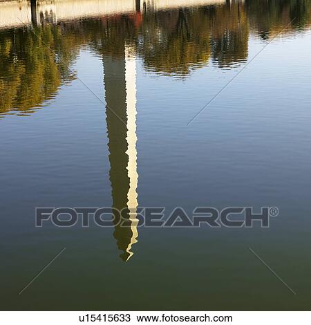 Stock Image - Washington Monument reflection in water in Washington, D. C., USA.. Fotosearch