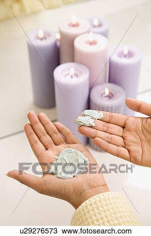 Woman's hands with facial scrub View Large Photo Image Stock Image - Woman's hands with facial scrub. Fotosearch