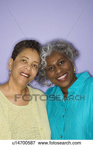 Women smiling View Large Photo Image Stock Photo - Women smiling. Fotosearch