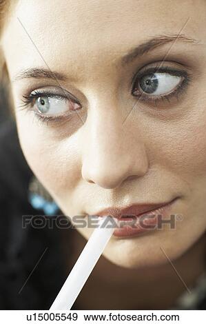 Stock Photo - Businesswoman working in an office. Fotosearch