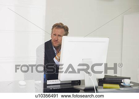Man at computer with reflections. View Large Photo Image Stock Image - Man at computer with reflections.. Fotosearch
