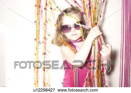 Stock Photo - Girl (2-4) dressed for a party.. Fotosearch