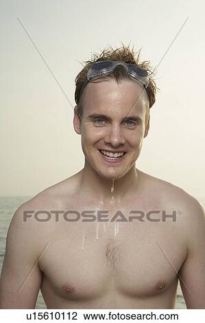 Portrait of wet male swimmer. View Large Photo Image Stock Image - Portrait of wet male swimmer.. Fotosearch
