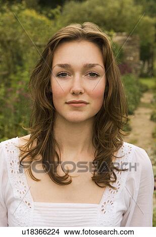 Picture - A portrait of a female in a garden. Fotosearch