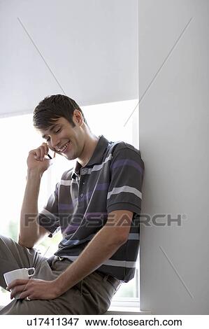 Businessman using mobile phone View Large Photo Image Stock Photo - Businessman using mobile phone. Fotosearch