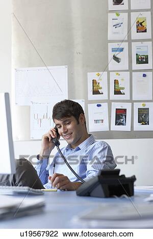 Businessman using telephone View Large Photo Image Stock Image - Businessman using telephone. Fotosearch