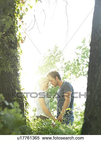 Couple in woods View Large Photo Image Stock Photography - Couple in woods. Fotosearch