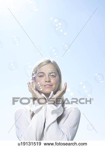 Stock Photo - Girl with bubbles. Fotosearch