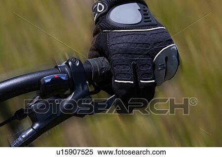 Hand using a bike brake View Large Photo Image Stock Photography - Hand using a bike brake. Fotosearch