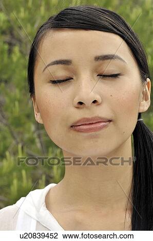 Portrait of a franco vietnamese woman View Large Photo Image Stock Image - Portrait of a franco vietnamese woman . Fotosearch