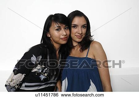 Stock Photograph - Portrait of two women. Fotosearch