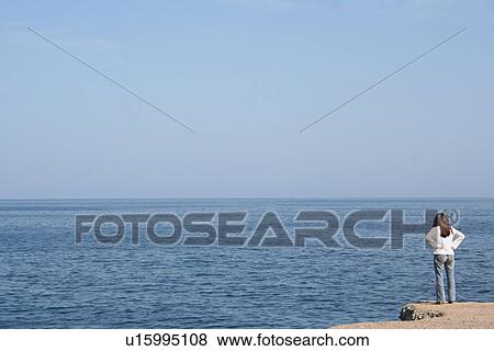 Stock Photo - oman, muscat, sea, view, one, female, woman. Fotosearch